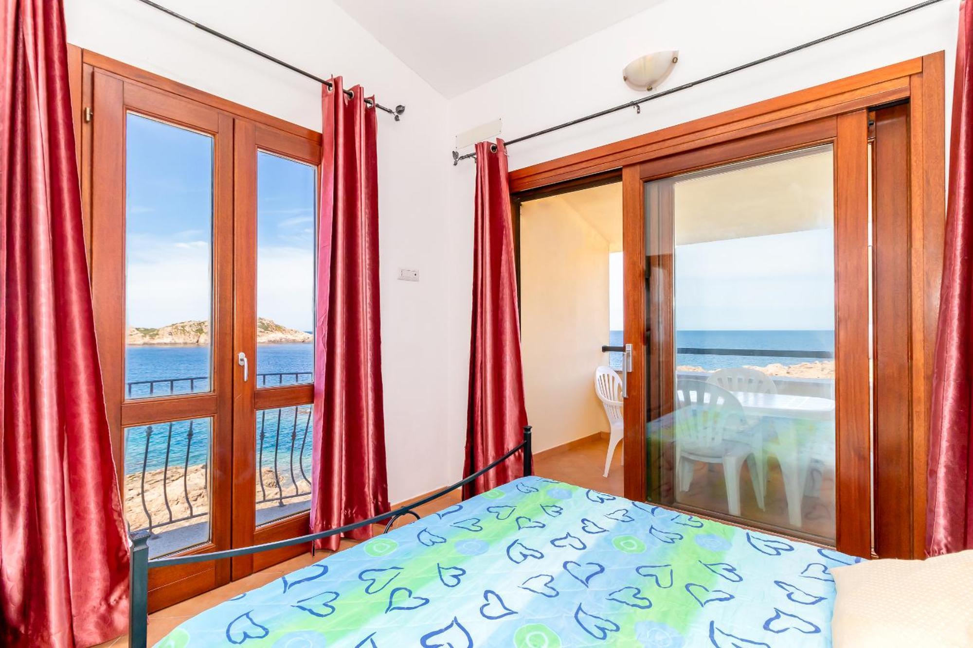 Casa Sulla Scogliera Isola Rossa Apartment Luaran gambar