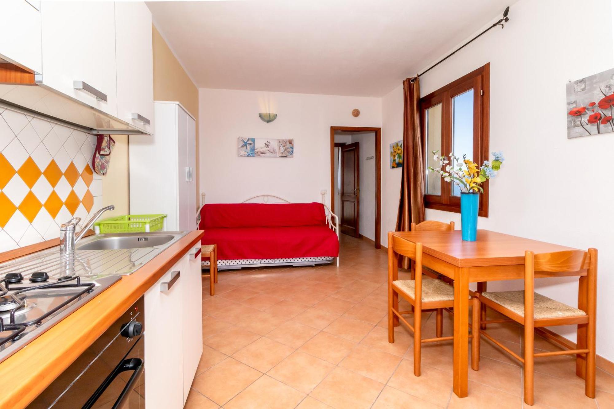 Casa Sulla Scogliera Isola Rossa Apartment Luaran gambar