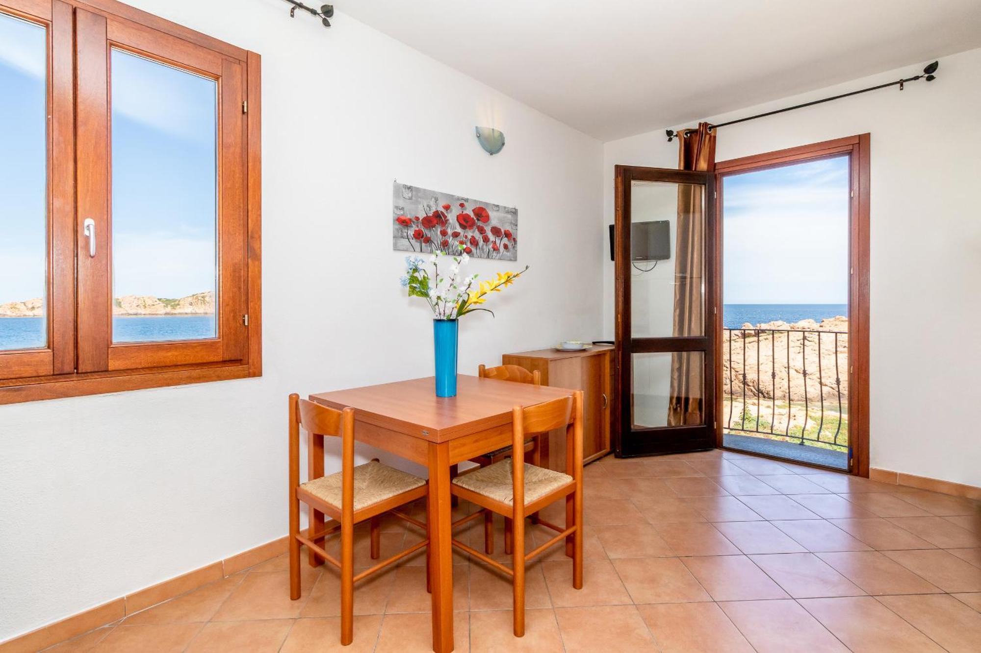 Casa Sulla Scogliera Isola Rossa Apartment Luaran gambar