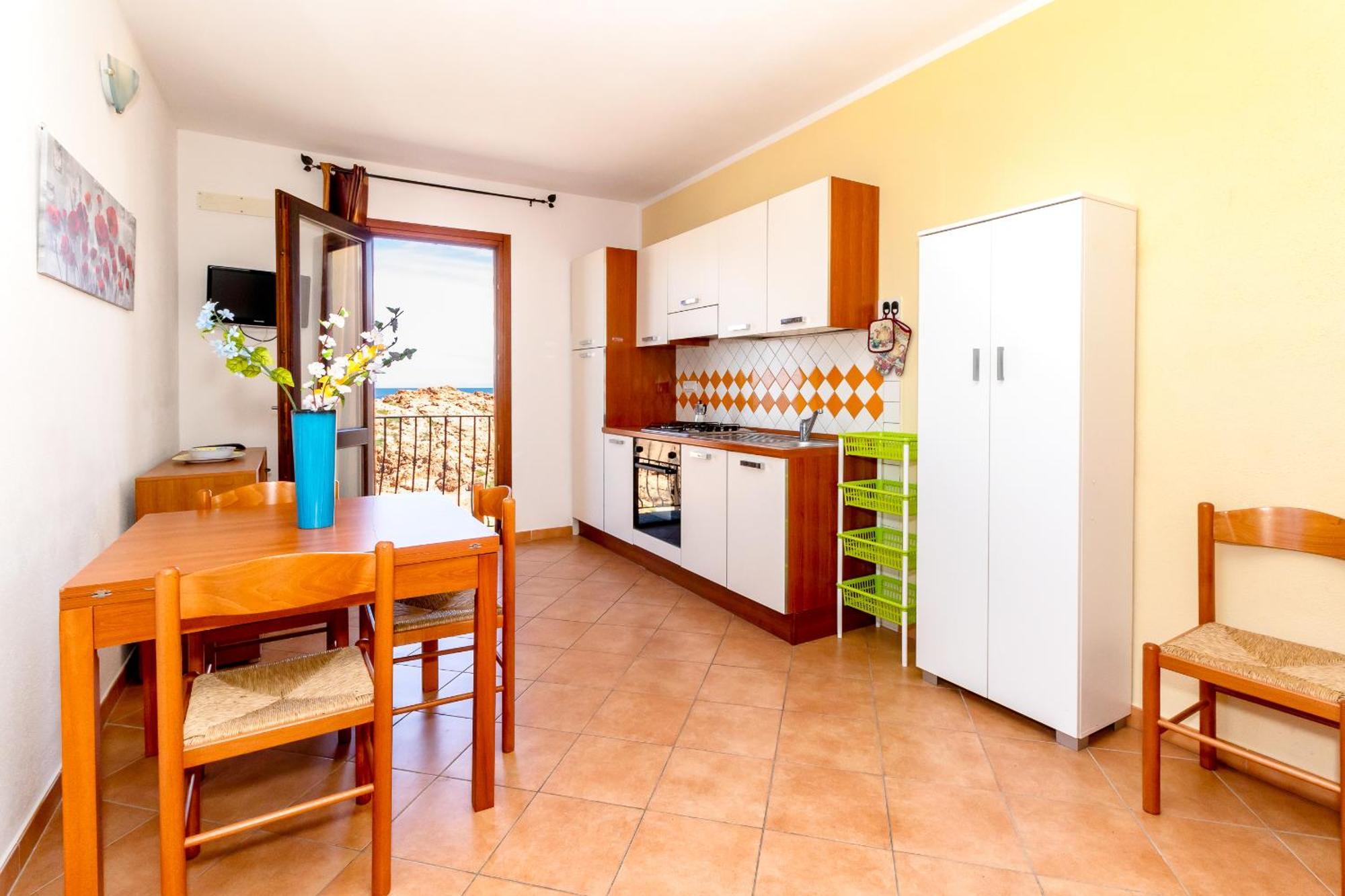 Casa Sulla Scogliera Isola Rossa Apartment Luaran gambar